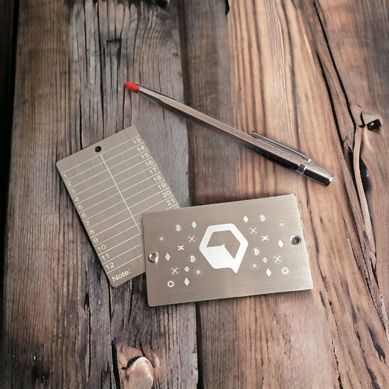 Metal Seed Phase Storage close up | Seed Phase Storage wallet and pen | 24 Word Seed Phrase Wallet close up