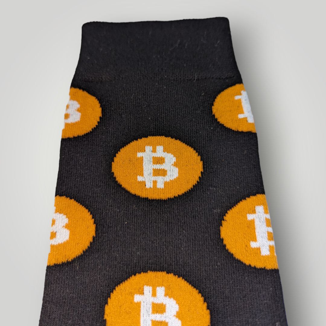 Bitcoin Logo Socks on floor | Cryptocurrency Footwear laid on floor | Unisex BTC Socks laid flat